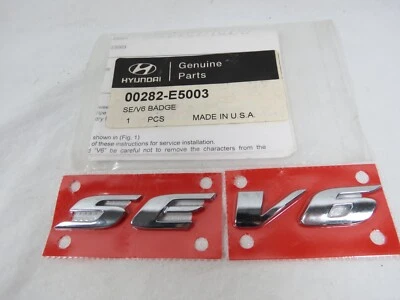 2003-2008 Hyundai Tiburon SE V6 Emblem For Rear Trunk Badge Logo Genuine OEM - Image 1 of 3