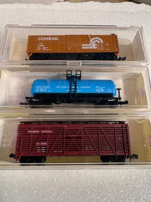 Lot of 3:  N Scale 40’ Model Power Mixed Road Name Freight Cars (25-833) - Image 1 of 2