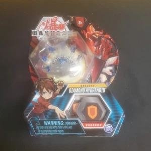 Bakugan Battle Planet Diamond Hydranoid con tarjeta y Bakucore translúcido casi nuevo - Imagen 1 de 6