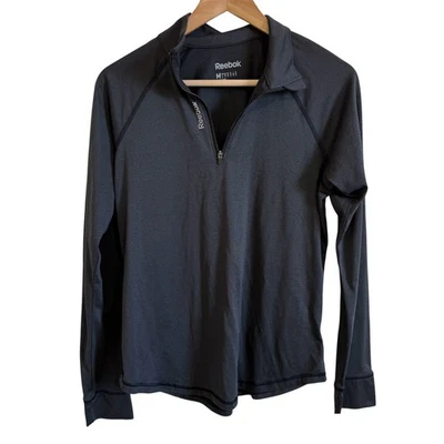 Pulôver Reebok feminino cinza médio manga longa 1/4 zíper atlético médio - Imagem 1 de 4