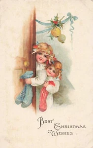 um 1910 Weihnachtspostkarte mit süßen Schwestern begeistert am Weihnachtsmorgen - Bild 1 von 2