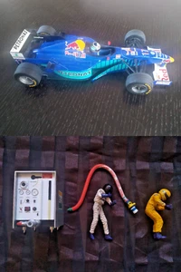 onyx sauber petronas formula 1 car and fuel crew - Picture 1 of 6