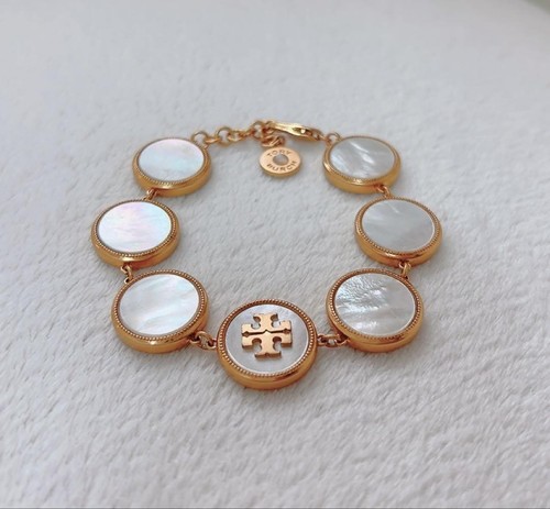 Bracciale Tory Burch tono oro u ottime condizioni stile slip on
