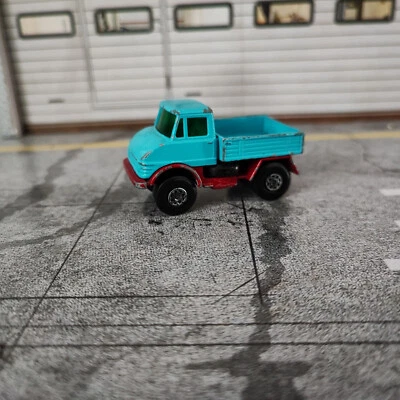 Matchbox Superfast No.49 Unimog blau/rot  Modellauto - Bild 1 von 4