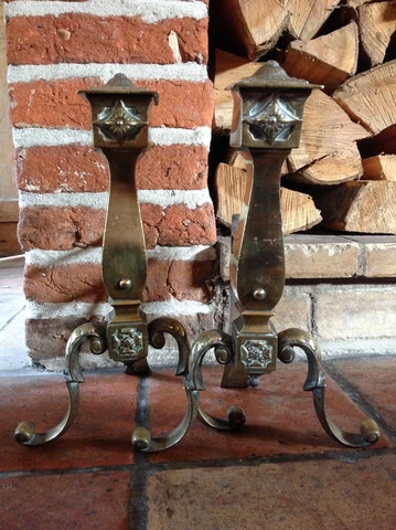 Pair of Antique brass fire dogs / Andirons in the revivalist style Cover