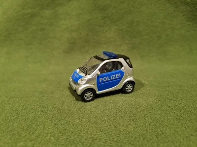 SIKU SMART TWO DOORS POLIZEI GERMANY SCALA 1/55  - Immagine 1 di 4