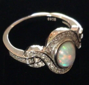 Sterling silver Oval Fire Opal Sparkling Infinity Promise Ring size Q 1/2 - Picture 1 of 7