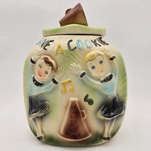 Tarro de galletas American Bisque Pottery Corner Cheerleaders cocina de colección Have A Co - Imagen 1 de 20