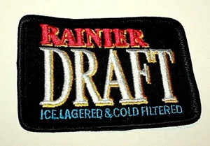 Vintage Rainier Draft Beer brewing Distributor black Cloth Patch 1980s NOS New - Picture 1 of 1