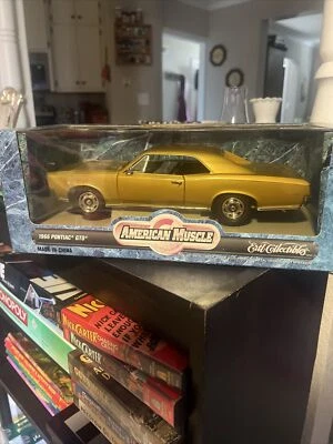Новый!! Винтажный металлический ERTL American Muscle «1966 Pontiac GTO» маслкар (масштаб 1:18) - Изображение 1 из 2