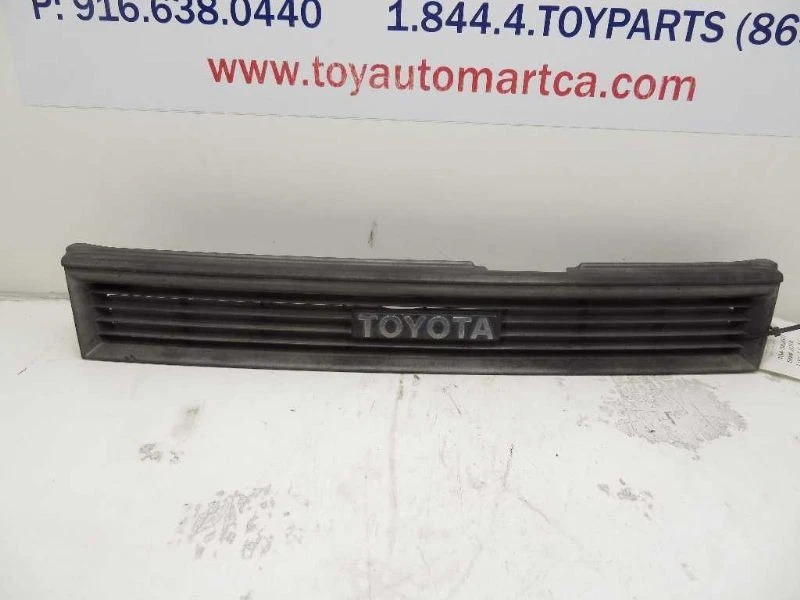 88-92 TOYOTA COROLLA DX GRILLE WITH EMBLEM  - Image 1 of 4