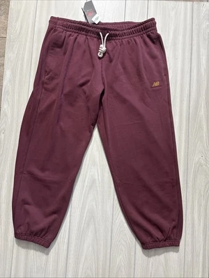 Joggers NEW BALANCE polar para hombre granate cónico  Foto 1 de 4