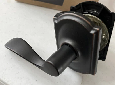 Juego de palancas de puerta de paso SCHLAGE F10 ACC 716 CAM decorativas camelot bronce envejecido Foto 1 de 4