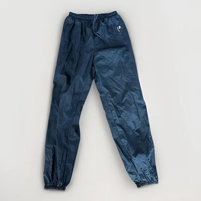 Pantalones cortavientos vintage años 90 Pro Player para hombre M azul marino cremallera al tobillo Foto 1 de 4