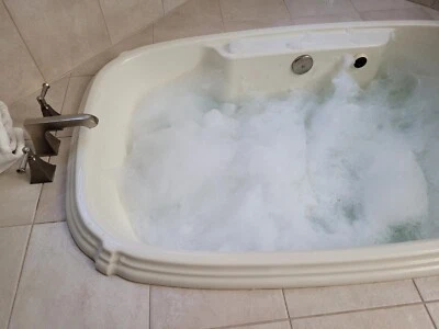 Whirlpool drop-in soaking tub-64"x40" American Standard with tub filler hardware - Image 1 of 3