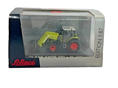 Schuco 1:87 25597 Claas Axos 330 + FL 100 Tractor in Original Box - Image 1 of 4