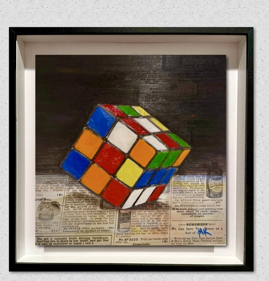 Pintura colorida del cubo de Rubik - Arte pop moderno sobre metal con impresión de periódico Foto 1 de 1