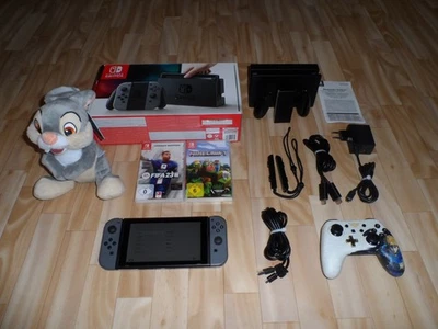 Nintendo Switch Konsole Grau in OVP + Controller + 2x Spiele + Plüsch Figur - Bild 1 von 4