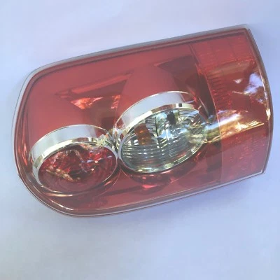 GENUINE PARTS LE43-51-150B  LAMP (R) RR.COMBO MAZDA 2004-2006  - Image 1 of 4