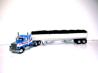 DCP FIRST GEAR 1/64 BLUE&WHITE FORD LTL 9000 60" FT SLEEPER&WILSON GRAIN TRAILER - Image 1 of 4