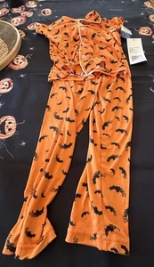 Juego de ropa de dormir Little Dreamer naranja con murciélagos negros talla 5 - Imagen 1 de 6