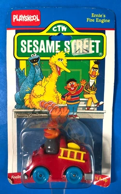 Coche de juguete fundido a presión Playskool CTW 1981 CALLE SÉSAMO MOTOR DE BOMBEROS ERNIE CARDADO Foto 1 de 4