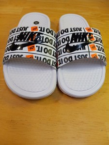 orange nike benassi slides