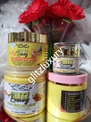 4 piezas. Oshaprapra Glitzluxury crema corporal, jabón de molato, crema facial y exfoliante de cúrcuma Foto 1 de 4