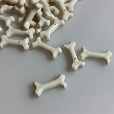 50 per lot NEW LEGO White 2 M. Ø3.2 Bones (93160/4600294) bone short minifigure - Image 1 of 3