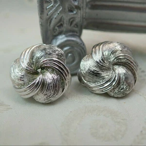 Vintage Monet Brushed Silver Plated Swirled Knot Clip Earrings - Picture 1 of 5