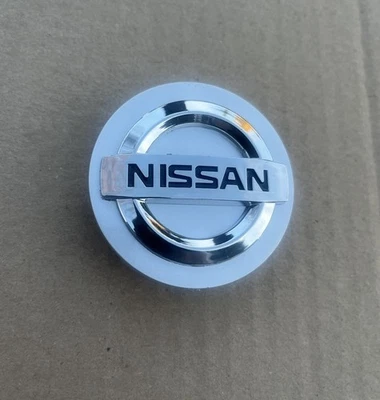 Tapacubos centrales de llanta de rueda Nissan plateada/cromo 60 mm/2,362 pulgadas 1 pieza OEM Foto 1 de 4