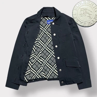 Chaqueta forrada Burberry Blue Label con botones con logotipo y cuadros Nova Foto 1 de 4