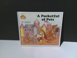 Magic Castle Readers/A Pocketful of Pets/A Book about Finding a Pet - Picture 1 of 5