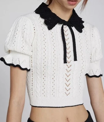 Suéter Bisou Marfil Negro Pointelle Manga Corta Talla Mediana Foto 1 de 4