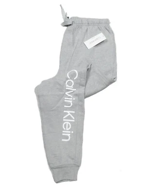 Pantalones de salón Calvin Klein para hombre gris con logotipo gráfico Foto 1 de 4