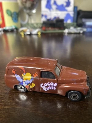 Matchbox 1995 FJ Holden Panel Van (Cocoa Puffs) marrón Foto 1 de 4