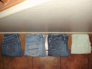 JEANS DE MUJER PARA NIÑA TALLA. 4 ÁGUILA AMERICANA Y ABERCROMBIE Y FITCH USADOS SUAVEMENTE - Imagen 1 de 21