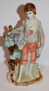 Estatuilla de porcelana Joven con uvas - Imagen 1 de 2
