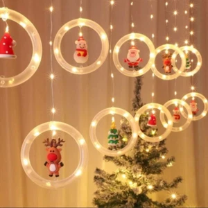 CATENA LUMINOSA NATALE TENDA NATALIZIA 5MT 100LED CERCHI LUCE CALDA E PERSONAGGI - Imagen 1 de 6