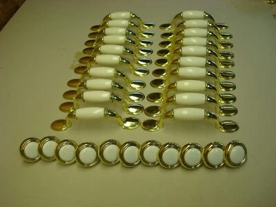 20  Gold Colored w/White Ceramic Cabinet  Style Handles and 11 knobs With Screws - Image 1 of 4