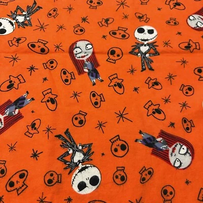 15" Nightmare before Christmas Skulls on Orange Disney Cotton Flannel Fabric - Image 1 of 3