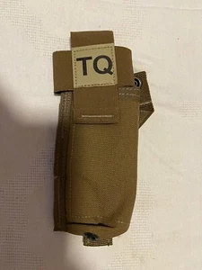 Soporte de torniquete militar estadounidense C-A-T MOLLE TQ CAT bolsa coyote marrón - Imagen 1 de 4