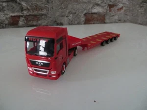 Herpa MAN TGX XLX Semitieflade-Sattelzug "Markewitsch" - Bild 1 von 4