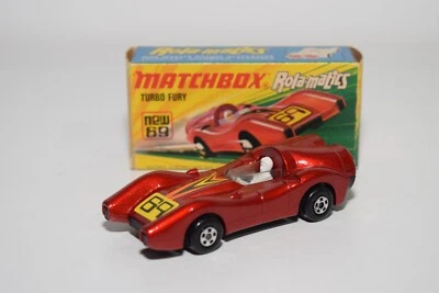 A94 1:64 3 INCH MATCHBOX SUPERFAST 69 TURBO FURY ROSSO METALLIZZATO VNMIB - Immagine 1 di 4