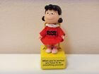 vintage Peanuts Lucy "philosophy" doll from 1990, mint on stand