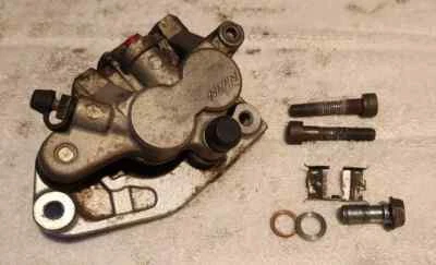 Kawasaki KX125 1999-2002 genuino OEM conjunto de pinza de freno delantera 43041-1721 Foto 1 de 4