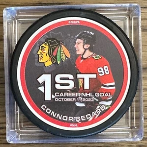 Connor Bedard / 1st Career NHL Goal / Chicago Blackhawks / Souvenir Puck - Picture 1 of 2