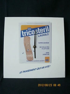 PENDULE PUBLICITAIRE DES PANSEMENTS TRICOSTERIL . - Picture 1 of 1