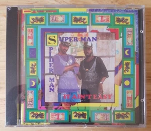 *TOUT NEUF* SUPER MAN & SPIDER MAN It Ain't Easy : CD reggae, Ska & Dub - Photo 1/3