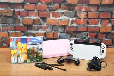 NINTENDO Switch OLED Konsole HEG-001 weiss + 3 Spiele Minecraft Pikachu + Tasche - Bild 1 von 4